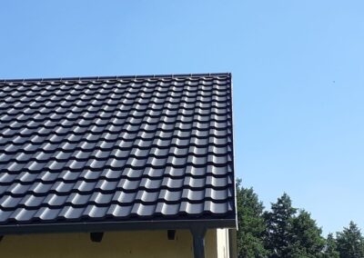 Człuchów dekarz wymiana pokrycia blachodachówka Panorama